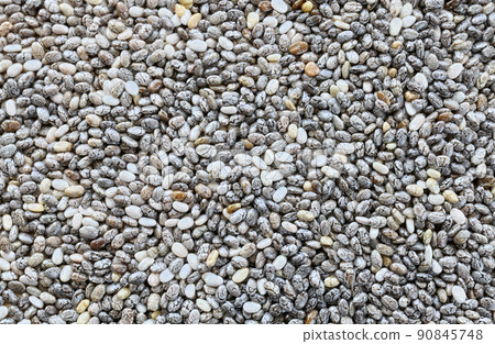 Close up picture of chia seeds, abstract food background Close up picture of chia seeds, abstract food background 90845748