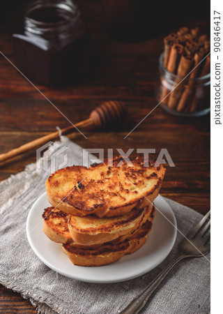 French toasts on white plate 90846417