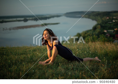 Yoga practice and meditation outdoor. Girl in the park 90846480