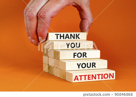 Thank you for attention symbol. Concept words Thank you for your attention on wooden blocks on beautiful orange table orange background. Businessman hand. Business and thank you for attention concept. 90846868