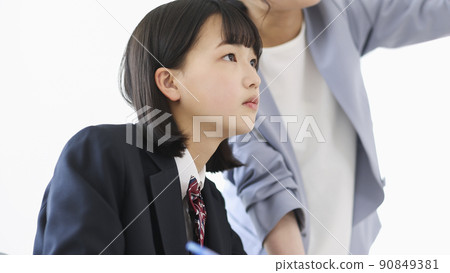 Female students taking classes at cram school Junior high school high school students 90849381