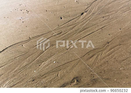 Rippled coastal sandy beach 90850232