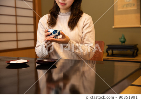 A woman relaxing at an inn trip A woman relaxing at an inn trip 90851991