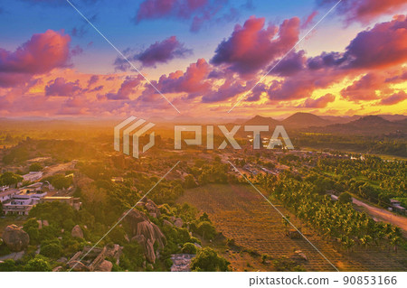 Beautiful evening view of Hampi ruins from Matanga Hill Beautiful evening view of Hampi ruins from Matanga Hill 90853166