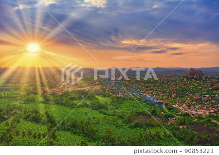 Beautiful evening view of Hampi ruins from Matanga Hill Beautiful evening view of Hampi ruins from Matanga Hill 90853221
