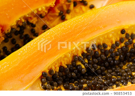 Close up of of ripe papaya. View of the Inside of a Papaya. Sweet tropical fruit Close up of of ripe papaya. View of the Inside of a Papaya. Sweet tropical fruit 90853453