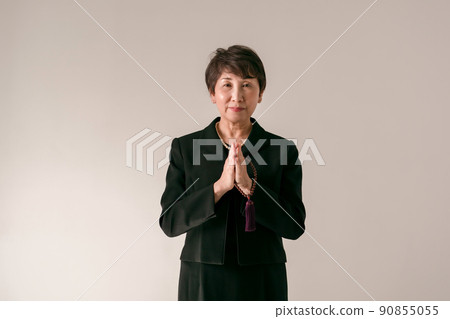 Senior woman funeral gassho Senior woman funeral gassho 90855055