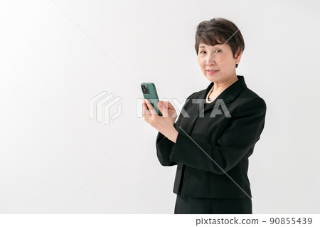 Women in mourning dress smartphone funeral Women in mourning dress smartphone funeral 90855439