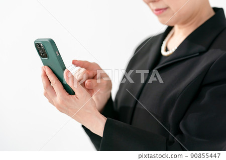 Women in mourning dress smartphone funeral Women in mourning dress smartphone funeral 90855447