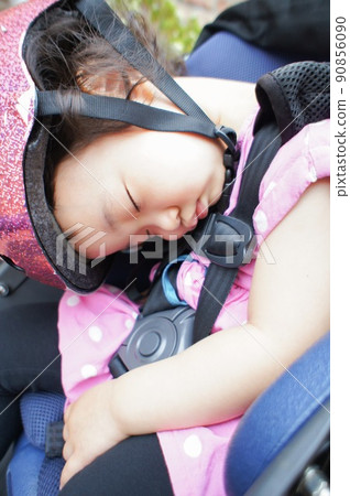 Baby sleeping in bike seat top