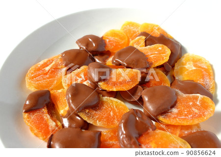 Chocolate-covered dry oranges Chocolate-covered dry oranges 90856624