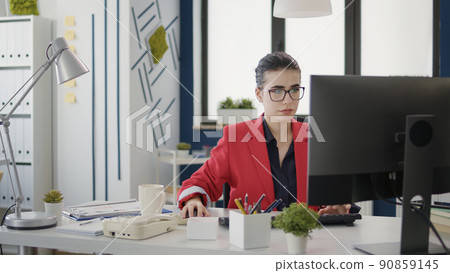 Project manager working on financial growth with sales charts, doing statistics research. Consultant planning marketing data analysis on computer for business development in office. Project manager working on financial growth with sales charts, doing statistics research. Consultant planning marketing data analysis on computer for business development in office. 90859145