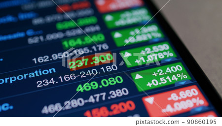 Stock market data shown on tablet computer screen Stock market data shown on tablet computer screen 90860195