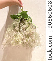 A bouquet of smoke trees hung by hand 90860608