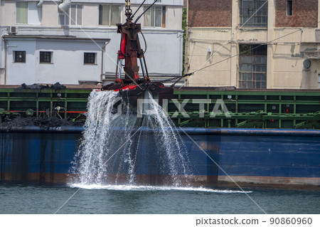Harbor dredge while working detail Harbor dredge while working detail 90860960