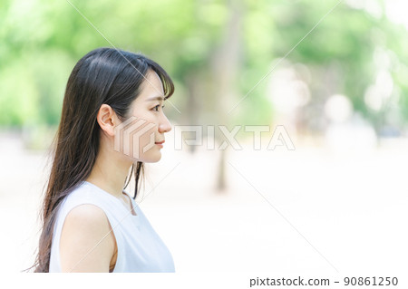 Fresh green and profile woman (black hair, serious) Fresh green and profile woman (black hair, serious) 90861250