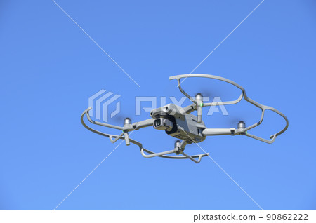 Drone in flight (empty back) Drone in flight (empty back) 90862222