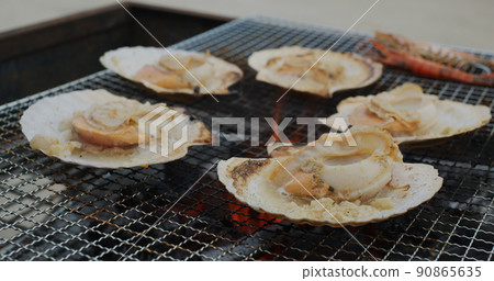 Fresh scallop on barbecue net Fresh scallop on barbecue net 90865635