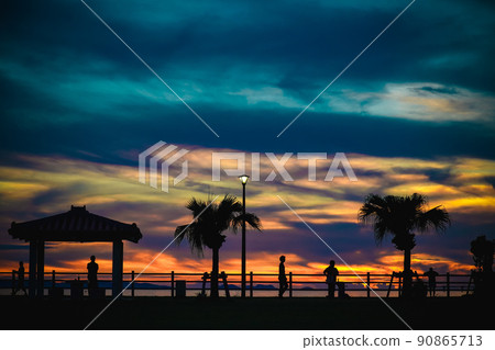 Mysteriously colored sunset by the sea 90865713