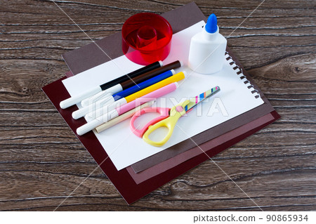 The child cuts out the details. Greeting Card guitar music. Children's art project, craft for children. Craft for children. 90865934