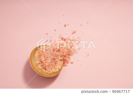 Top view of halit himalaya salt decorated with petri dish in pink background  90867717
