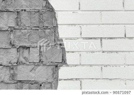 Brick grey broken masonry wall with cement white concrete damaged facade background texture old 90871097