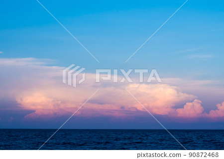 Pink clouds and sunset sky over sea 90872468
