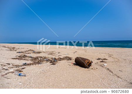 Debris washed ashore on the beach Debris washed ashore on the beach 90872680