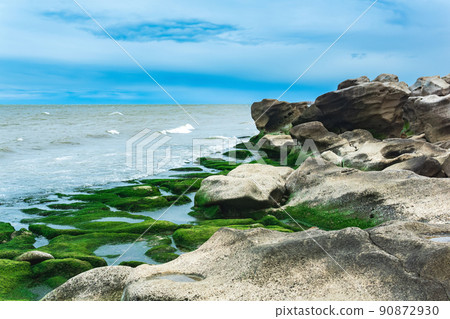 seascape, shore of the Caspian Sea with algae-covered coastal stones seascape, shore of the Caspian Sea with algae-covered coastal stones 90872930