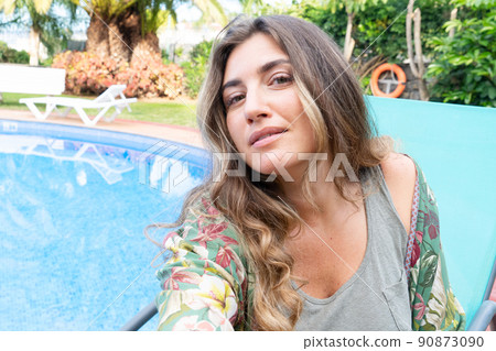 Beautiful woman doing selfie shot Beautiful woman doing selfie shot 90873090