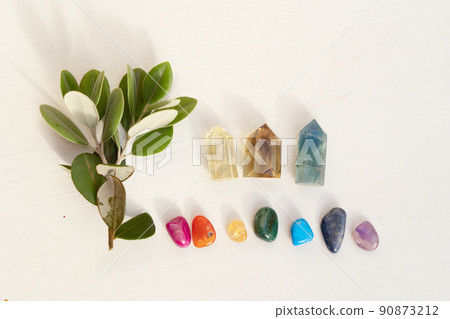 Healing crystals on brown background Healing crystals on brown background 90873212
