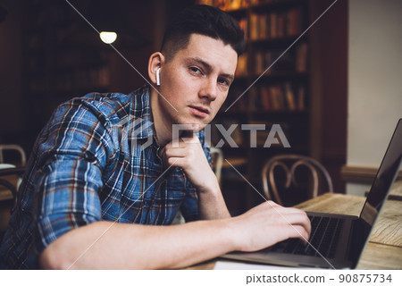 Caucasian IT professional working remotely Caucasian IT professional working remotely 90875734