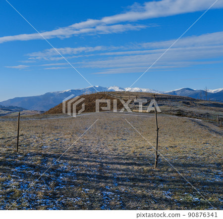 Last good weather days in autumn mountain countryside morning peaceful picturesque scene. Ukrainian Carpathians mountains in far. Last good weather days in autumn mountain countryside morning peaceful picturesque scene. Ukrainian Carpathians mountains in far. 90876341