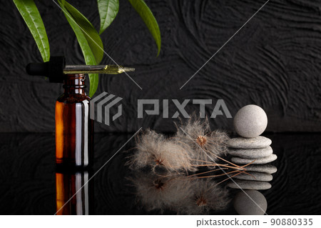 Cosmetological product for facial care. Oil in pipette bottle. Essential oil for skin care. Spa composition, copy-space. Cosmetological product for facial care. Oil in pipette bottle. Essential oil for skin care. Spa composition, copy-space. 90880335