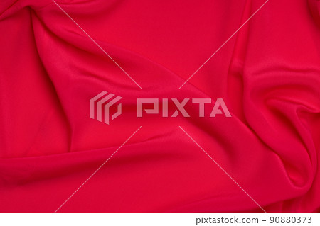 Abstract background of red silk fabric. Texture, luxury, fashion, style 90880373