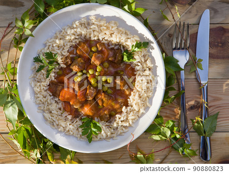 Healthy food with rice on a wooden table. Flat lay photo. . 90880823