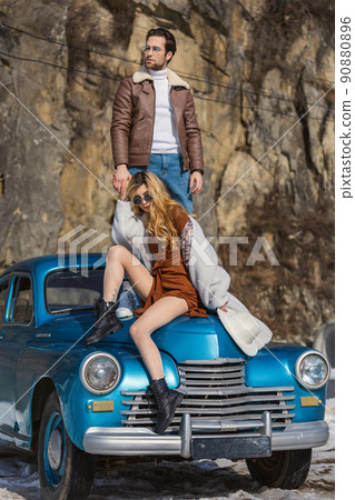 beautiful couple on a retro car beautiful couple on a retro car 90880896
