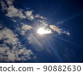 Sun, blue sky, clouds 90882630