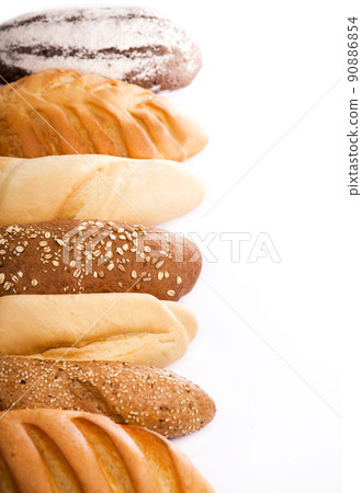 Fresh baked traditional bread. Fresh bread assortment on the white background Fresh baked traditional bread. Fresh bread assortment on the white background 90886854