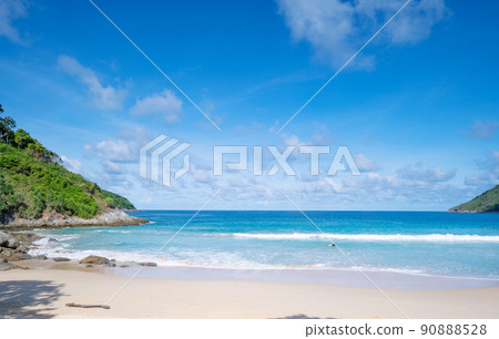 Summer sea season greeting background. Tropical sandy beach with blue ocean and blue sky background image for nature background or summer background in Phuket Thailand 90888528