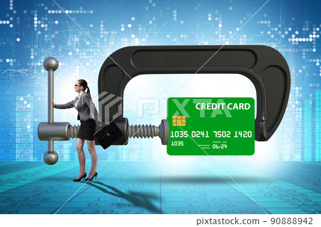 Concept of credit card debt with clamp and businesswoman Concept of credit card debt with clamp and businesswoman 90888942