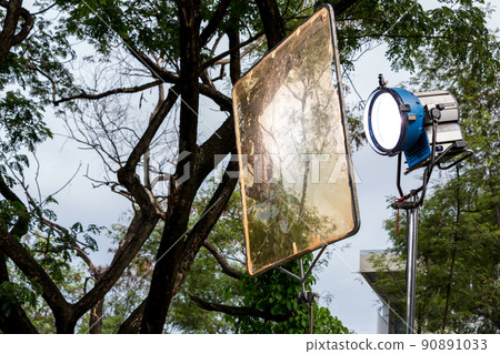 Process of filming. Spotlight illuminates Process of filming. Spotlight illuminates 90891033