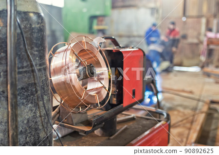 Working atmosphere in an old welding shop for the welding of metal 90892625