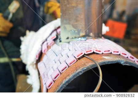 Welder in the shop weld sample from the tube with concomitant heating for attestation Welder in the shop weld sample from the tube with concomitant heating for attestation 90892632