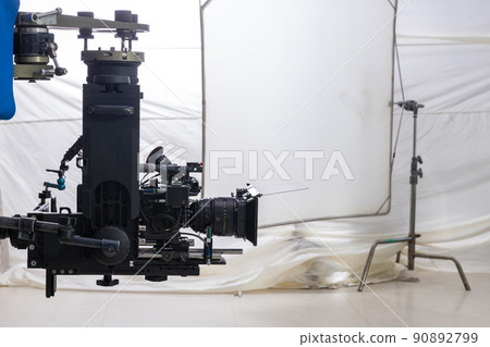 Movie shooting or video production and film crew team with camera equipment. Movie shooting or video production and film crew team with camera equipment. 90892799