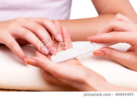 Young woman in nail treatment medical concept 90893495