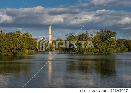 Lednice Minaret - romantic lookout tower in Castle Park. A tower on the banks of the Castle Pond Lednice Minaret - romantic lookout tower in Castle Park. A tower on the banks of the Castle Pond 90893697