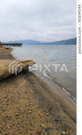 atmospheric photo landscape with a river and a big stone wallpaper for your phone 90894044