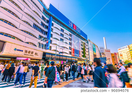 Tokyo cityscape of Japan GW with no action restrictions for the first time in 3 years. The number of people in front of Ikebukuro station is the same as before Korona-ka = May 4th 90894076