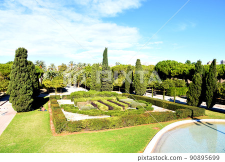 City park with gardens and trees in Valencia. 90895699
